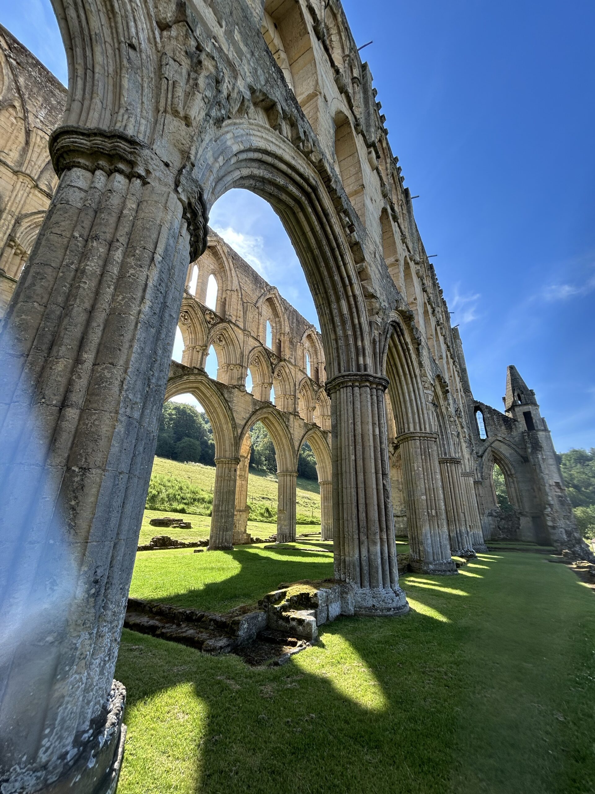 Old Abbey structure with the sun shining through